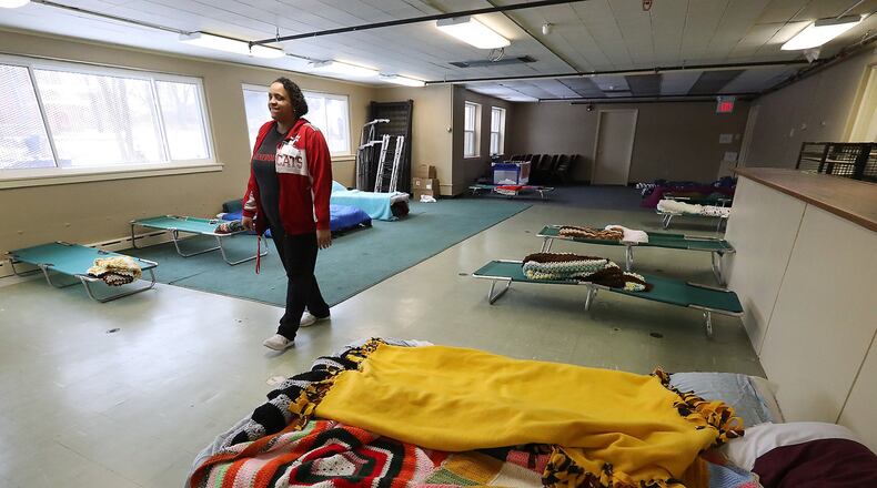 Larina Bias, program manager at Interfaith Hospitality Network, walks through overflow sleeping room at the Network’s Family Shelter. IHN is among Springfield organizations to receive grant from Housing and Urban Development to address homeless. Bill Lackey/Staff