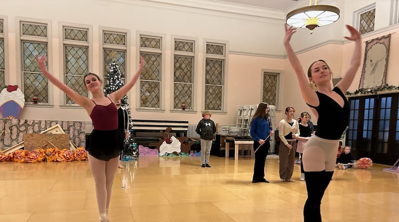 Lena Smith, left, will portray Clara and Moriah Smith, in her 20th year of participation, will perform in several roles during this weekend's 36th annual performance of "The Nutcracker" presented by the Ohio Performing Arts Institute at the Clark State Performing Arts Center. BRETT TURNER/CONTRIBUTOR