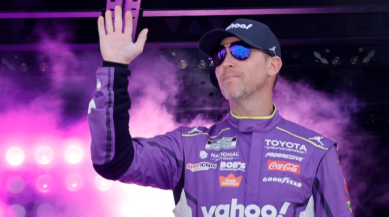 Denny Hamlin waves during driver introductions before a NASCAR Cup Series auto race at Las Vegas Motor Speedway Sunday, March 15, 2026, in Las Vegas. (AP Photo/Steve Marcus)