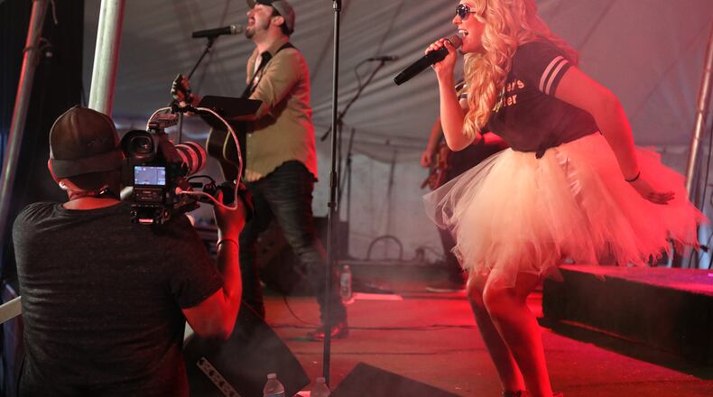 A videographer shoots a music video as Kate Hasting performs Wednesday at the Clark County Fair. BILL LACKEY/STAFF
