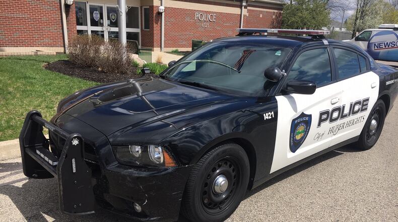 A Huber Heights Police cruiser suffered minor damage after reportedly using a PIT maneuver to stop the chase along I-70 in Clark County Sunday. MIKE CAMPBELL/STAFF