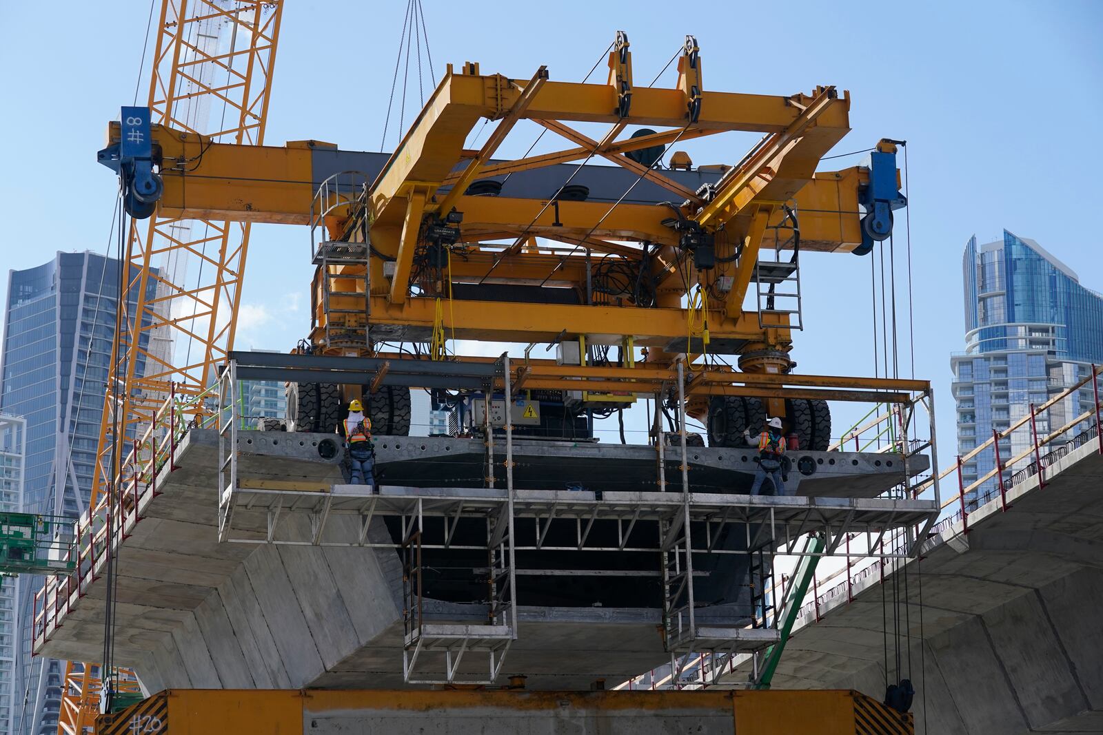 FILE - A construction crew works on a new segment of Interstate-395 on May 6, 2021, in Miami. (AP Photo/Marta Lavandier, File)