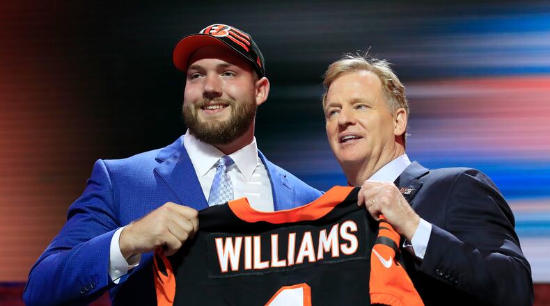 NASHVILLE, TENNESSEE - APRIL 25: Jonah Williams of Alabama poses with NFL Commissioner Roger Goodell after being chosen #11 overall by the Cincinnati Bengals during the first round of the 2019 NFL Draft on April 25, 2019 in Nashville, Tennessee. (Photo by Andy Lyons/Getty Images)
