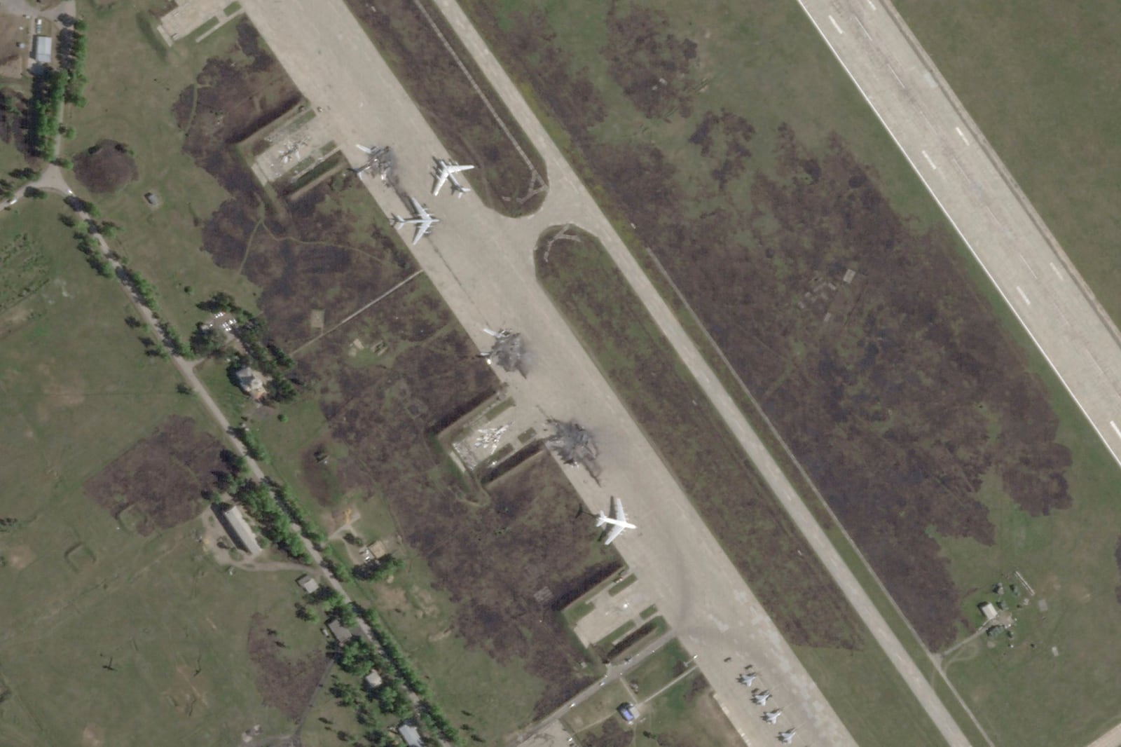 This satellite image from Planet Labs PBC shows damage after a Ukrainian drone attack targeted the Belaya Air Base in the Irkutsk region of eastern Siberia in Russia on Wednesday, June 4, 2025. (Planet Labs PBC via AP)