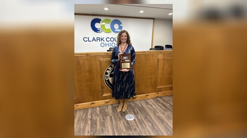 Melanie Flax Wilt received a plaque in recognition of her dedicated service as a commissioner to Clark County. She stepped down at the end of 2025. Brooke Spurlock/Staff