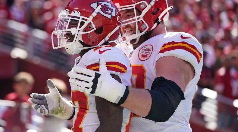 Kansas City Chiefs wide receiver Mecole Hardman, left, celebrates after scoring a touchdown with guard Joe Thuney during the first half of an NFL football game against the San Francisco 49ers in Santa Clara, Calif., Sunday, Oct. 23, 2022. (AP Photo/Godofredo A. Vásquez)