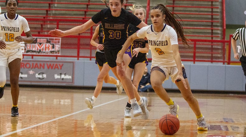 Springfield sophomore Milly Portis attacks the Bellbrook defense during the Wildcats' 57-55 tournament victory Wednesday at Troy High School. Jeff Gilbert/CONTRIBUTED