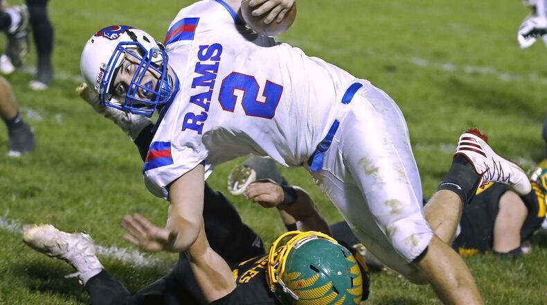 Greeneview’s Jacob Green runs over Madison-Plains’ Griffin Jones. Greeneview won the Week 10 game 35-0 to complete a 10-0 regular season. Bill Lackey/Staff
