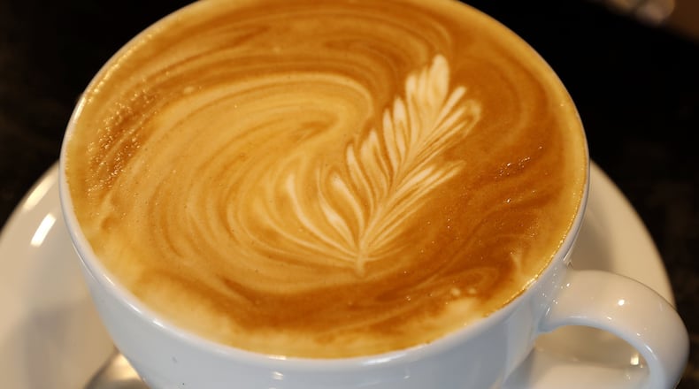 An elegant coffee drink prepared by David Tipton at Scout’s Cafe. Bill Lackey/Staff