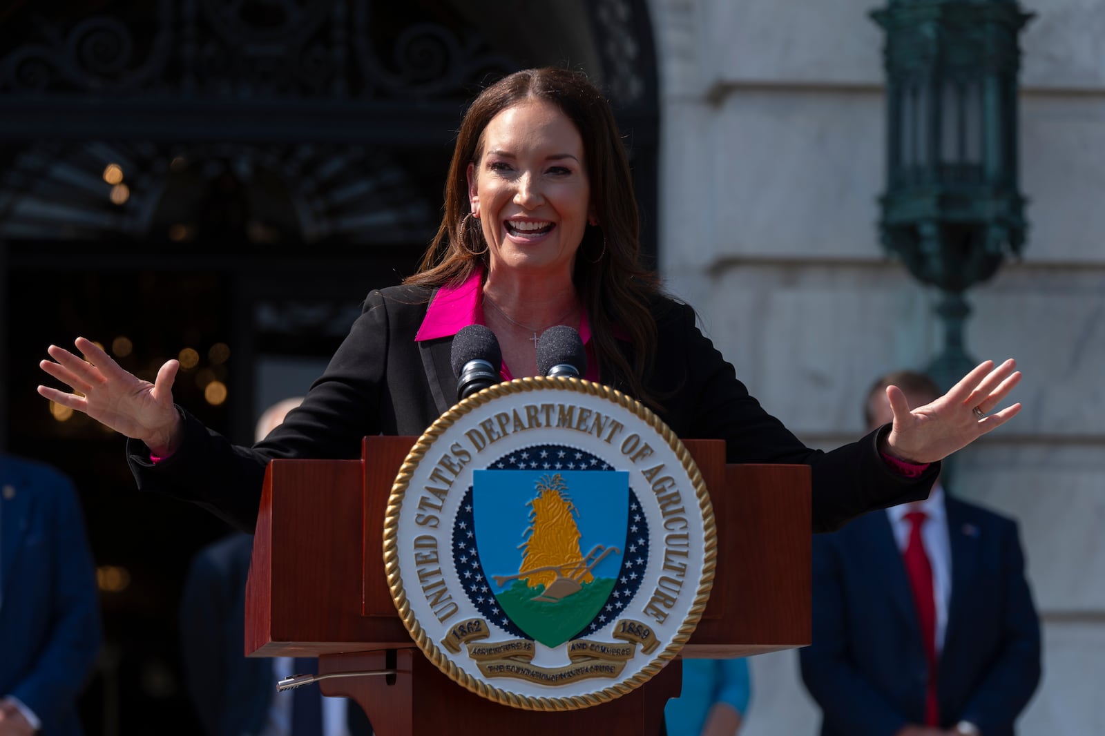 Agriculture Secretary Brooke Rollins peaks during a news conference at the Department of Agriculture to rollout the USDA'S National Farm Security Action Plan and discuss actions being taken to protect American agriculture from foreign threats in Washington, Tuesday, July 8, 2025. (AP Photo/Manuel Balce Ceneta)