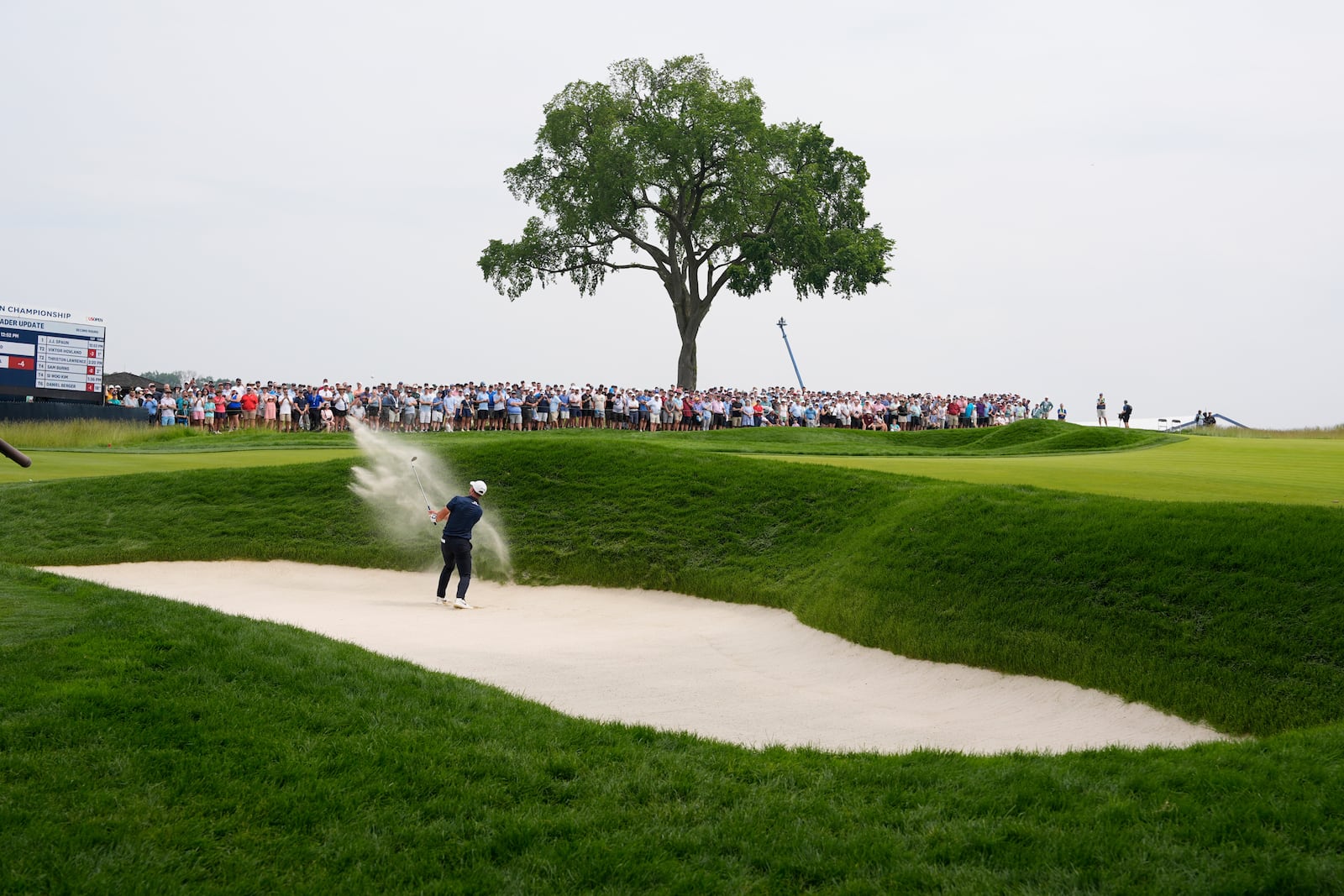 Viktor Hovland, of Norway, hits from a bunker on the second hole during the second round of the U.S. Open golf tournament at Oakmont Country Club Friday, June 13, 2025, in Oakmont, Pa. (AP Photo/Charlie Riedel)