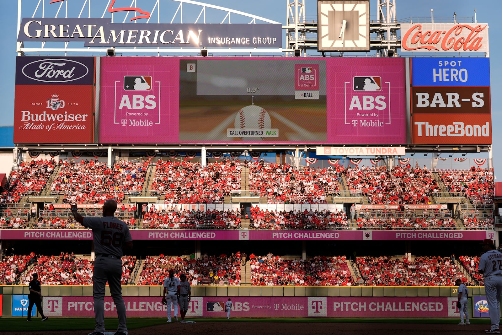 A call is overturned by Automated Ball-Strike System during the ninth inning of an opening-day baseball game between the Cincinnati Reds and the Boston Red Sox in Cincinnati, Thursday, March 26, 2026. (AP Photo/Carolyn Kaster)
