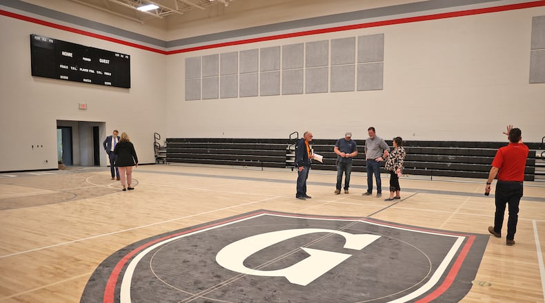 Greenon School Board officials toured the new, nearly complete, Greenon School earlier this month prior to the board meeting. BILL LACKEY/STAFF