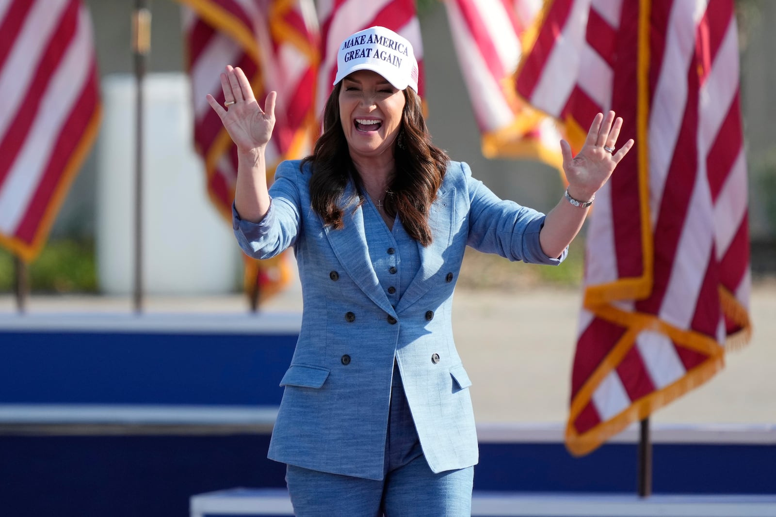 Agriculture Secretary Brooke Rollins arrives before President Donald Trump speaks during a rally, Thursday, July 3, 2025, in Des Moines, Iowa. (AP Photo/Charlie Neibergall)