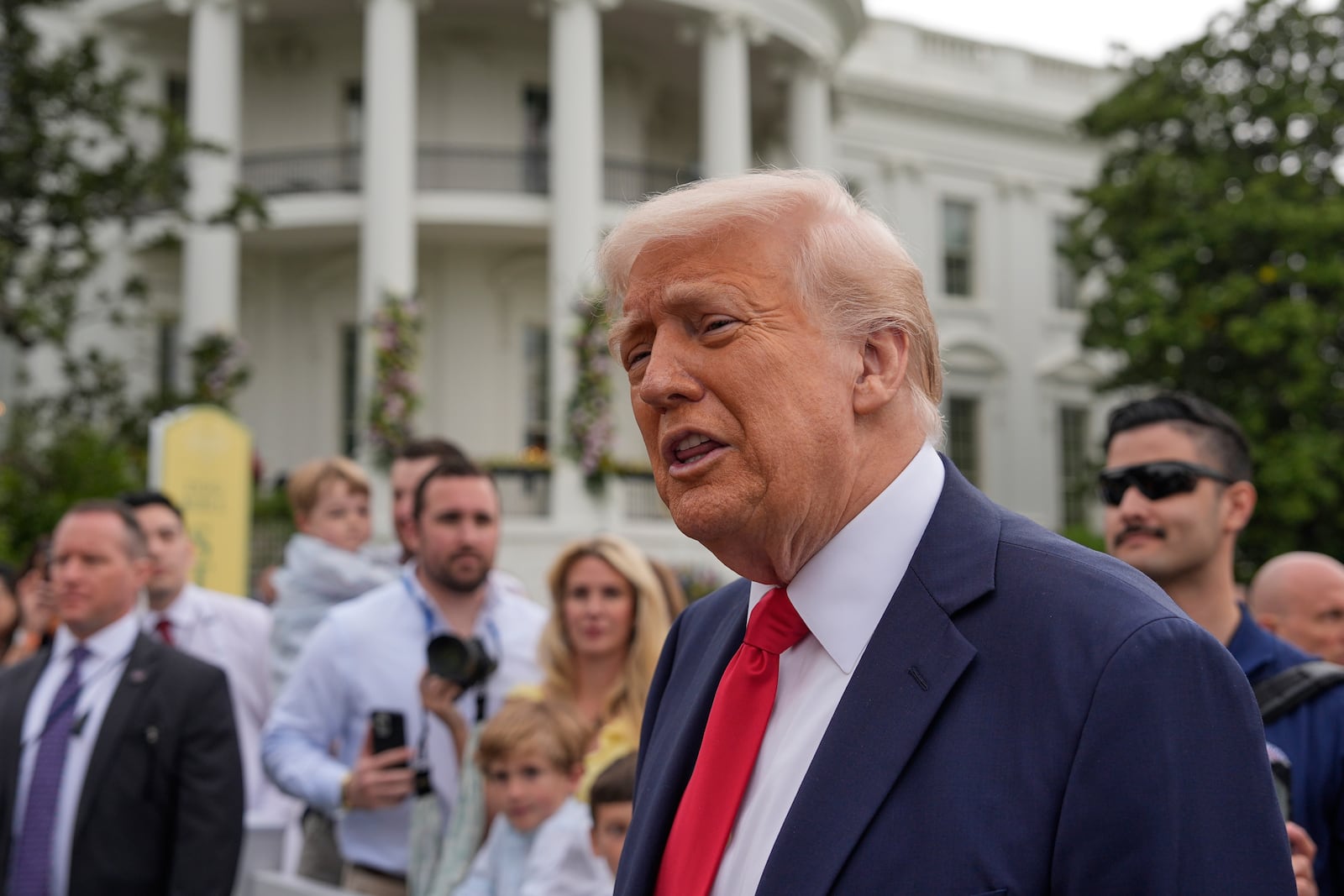 President Donald Trump speaks to reporters during the White House Easter Egg Roll on the South Lawn of the White House, Monday, April 21, 2025, in Washington. (AP Photo/Alex Brandon)