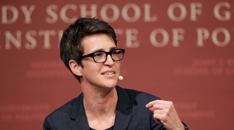 FILE - MSNBC television anchor Rachel Maddow, host of the Rachel Maddow Show, moderates a panel Oct. 16, 2017, at the Harvard University campus, in Cambridge, Mass. (AP Photo/Steven Senne, File)