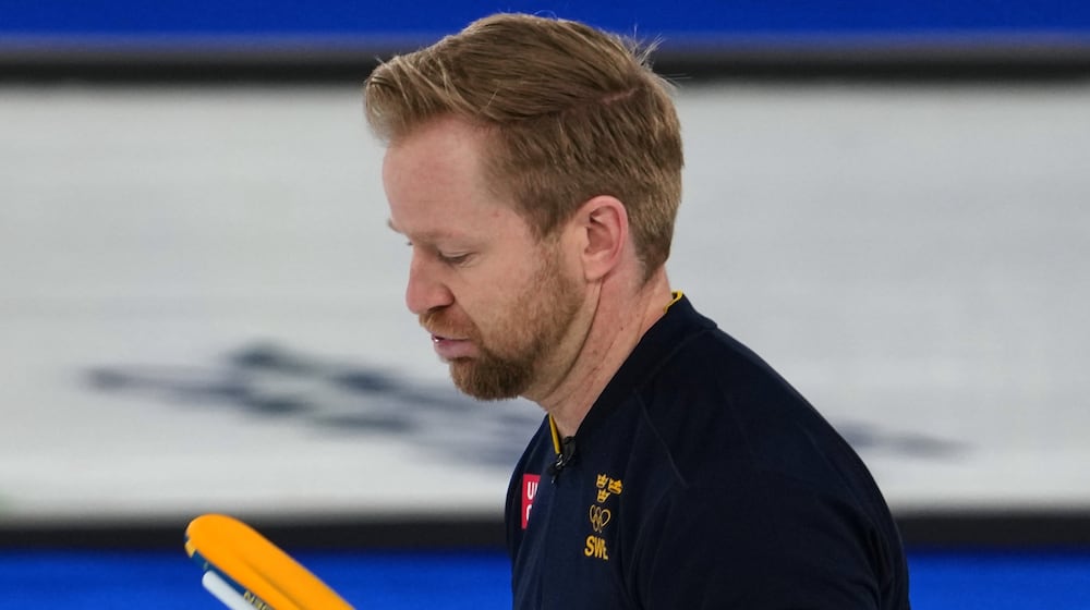 Sweden's Niklas Edin reacts after the men's curling round robin session against Germany, at the 2026 Winter Olympics, in Cortina d'Ampezzo, Italy, Monday, Feb. 16, 2026. (AP Photo/Misper Apawu)