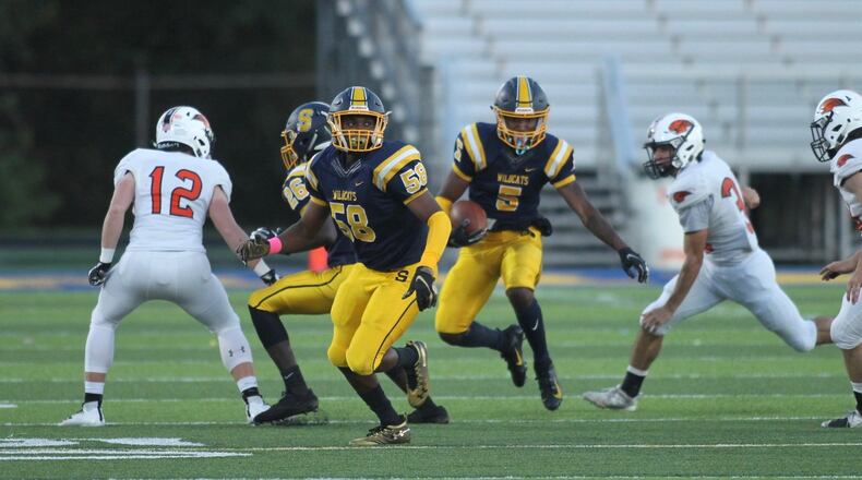 Springfield’s Larry Stephens runs against Beavercreek in the first half on Friday, Oct. 5, 2019, at Springfield High School. David Jablonski/Staff