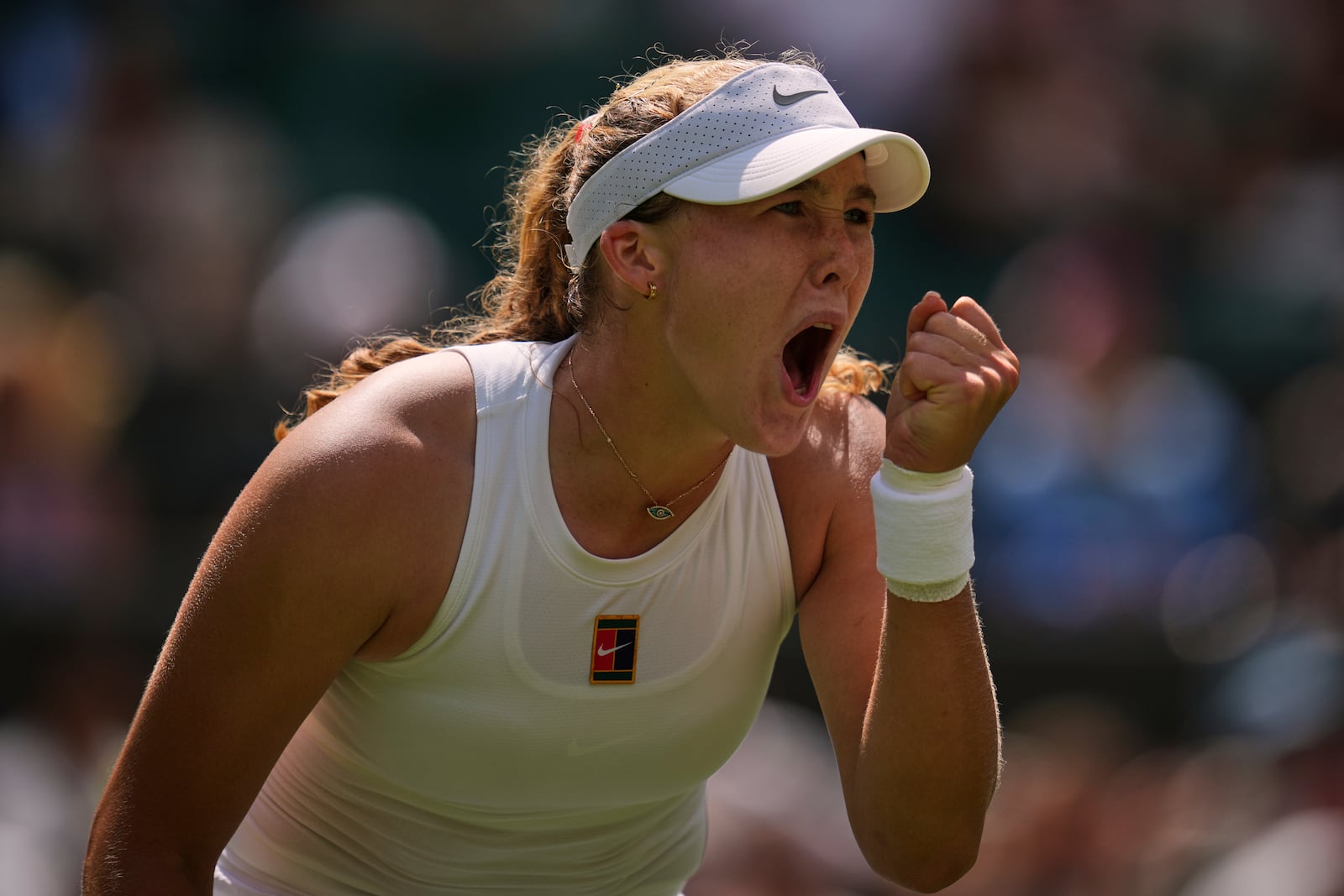 Mirra Andreeva of Russia reacts during her second round women's single match against Lucia Bronzetti of Italy at the Wimbledon Tennis Championships in London, Thursday, July 3, 2025.(AP Photo/Kin Cheung)