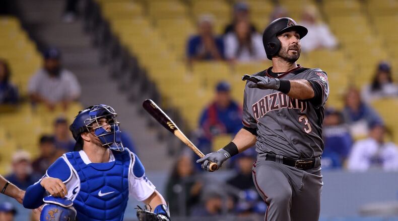 LOS ANGELES, CA - MAY 08: Daniel Descalso #3 of the Arizona Diamondbacks reacts to his three run homerun in front of Kyle Farmer #17 of the Los Angeles Dodgers, to take an 8-5 lead during the 12th inning at Dodger Stadium on May 8, 2018 in Los Angeles, California. (Photo by Harry How/Getty Images)