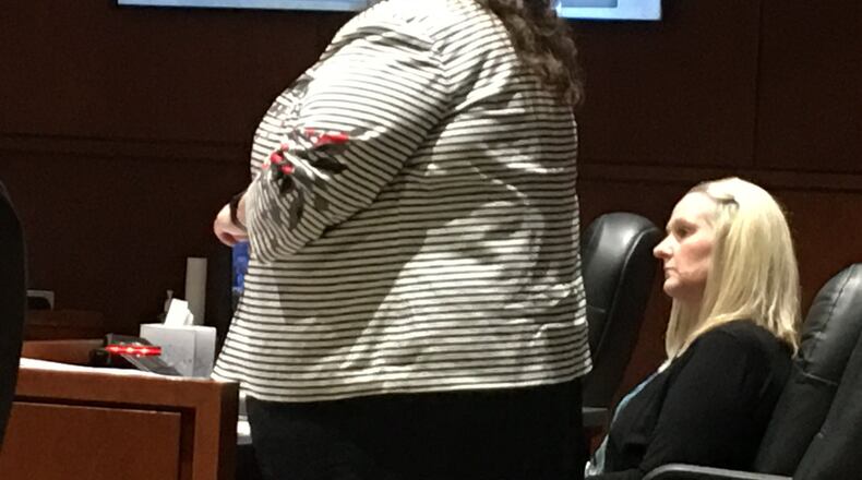 Former Springboro teacher Amy Panzeca listens as lawyer Andrea Ostrowski questions witnesses in court Wednesday, Aug. 8, 2018, in Lebanon. Her trial is to begin Monday. LAWRENCE BUDD/STAFF