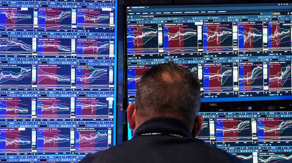 Specialist Anthony Matesic works at his post on the floor of the New York Stock Exchange, Monday, Feb. 2, 2026. (AP Photo/Richard Drew)