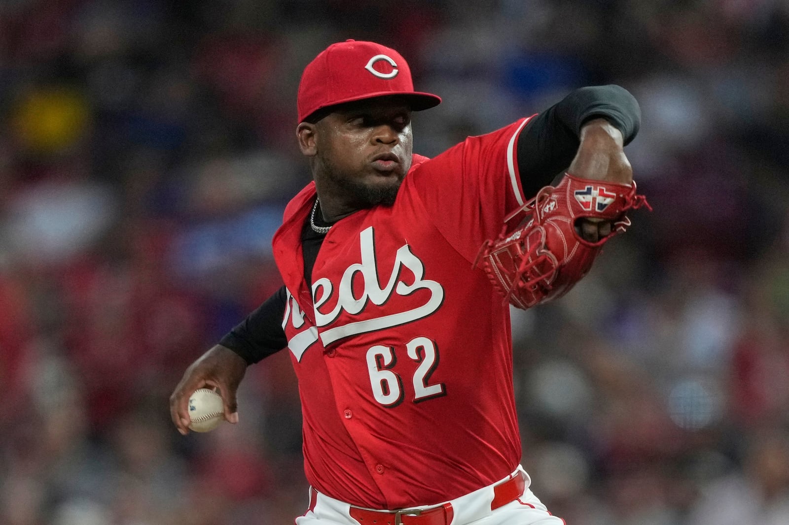 Cincinnati Reds' Luis Mey throws during the seventh inning of a baseball game against the Los Angeles Dodgers Wednesday, July 30, 2025, in Cincinnati. (AP Photo/Carolyn Kaster)