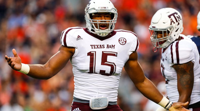 AUBURN, AL - SEPTEMBER 17: Defensive lineman Myles Garrett #15 of the Texas A&M Aggies celebrates after sacking quarterback Sean White of the Auburn Tigers during an NCAA college football game on September 17, 2016 in Auburn, Alabama. (Photo by Butch Dill/Getty Images)