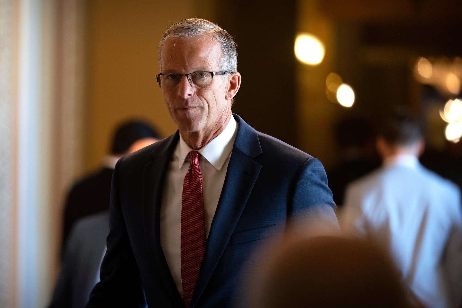 Senate Majority Leader John Thune, of S.D., walks toward the Senate chamber at the Capitol, Wednesday, July 16, 2025, in Washington. (AP Photo/Mark Schiefelbein)