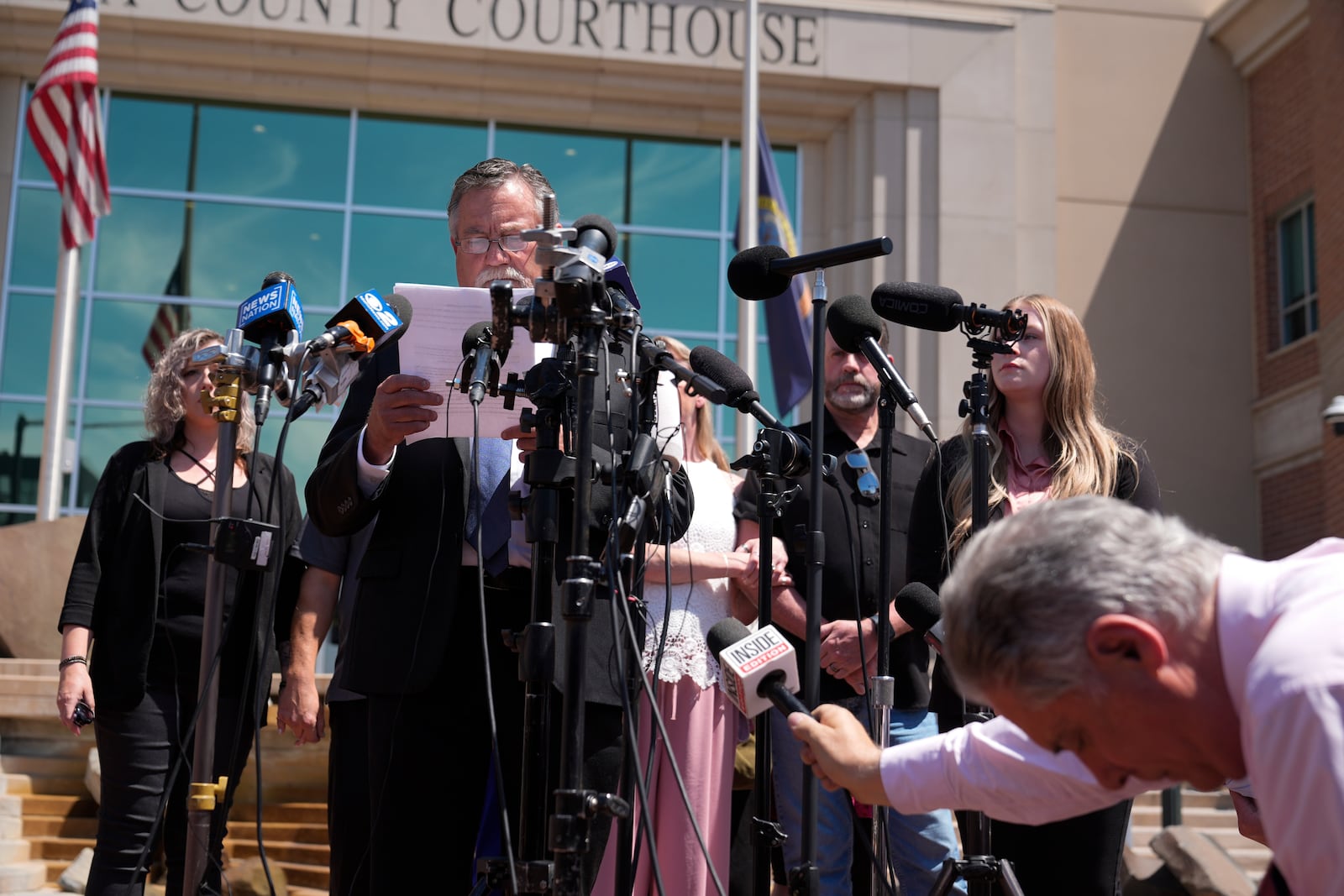 Members of the media cover a press conference outside the Ada County Courthouse as Bryan Kohberger pleaded guilty to murder in the fatal stabbing of four University of Idaho students in 2022 on Wednesday, July 2, 2025, in Boise, Idaho. (AP Photo/Jenny Kane)