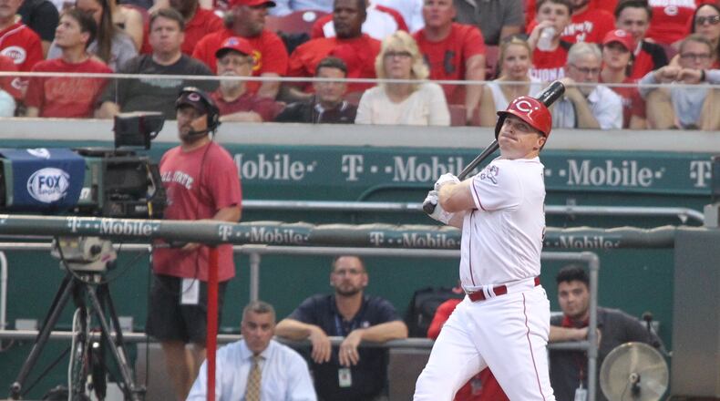 The Reds' Jay Bruce hits a two-run home run in the fourth inning against the Pirates on Wednesday, May 11, 2016, at Great American Ball Park in Cincinnati. David Jablonski/Staff