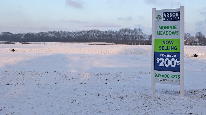 The Monroe Meadows housing development is progressing Friday, Jan. 3, 2025 with streets and signs. The only thing missing is the houses. BILL LACKEY/STAFF