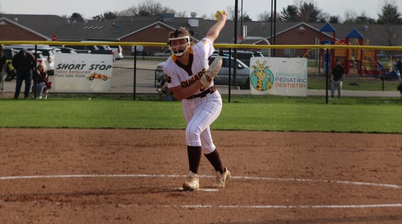 Kenton Ridge freshman Ivee Rastatter winds up to throw a pitch during the Cougars' 9-4 win over Shawnee on Wednesday night at Ed Foulk Field in Springfield. Jacob Benge/CONTRIBUTED PHOTO