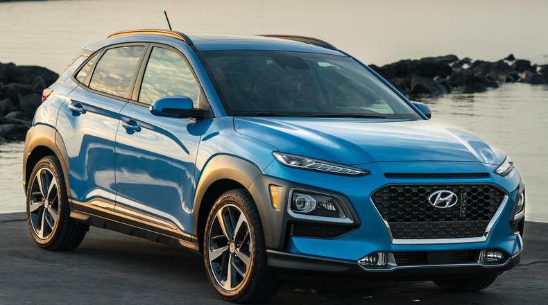 The Hyundai Kona compact crossover utility vehicle offers as standard Forward Collision-avoidance Assist, Lane Keeping Assist and Driver Attention Warning. All Konas come standard with tilt-and-telescopic steering wheel with audio, Bluetooth and cruise controls, and a 7-inch Display Audio touchscreen system with both Apple CarPlay and Android Auto capability. Kona is powered by a 2.0L Atkinson-cycle 4-cylinder with an optional 1.6L Turbo GDI engine that delivers 175 horsepower and 195 lbs.-ft of torque. Hyundai photo