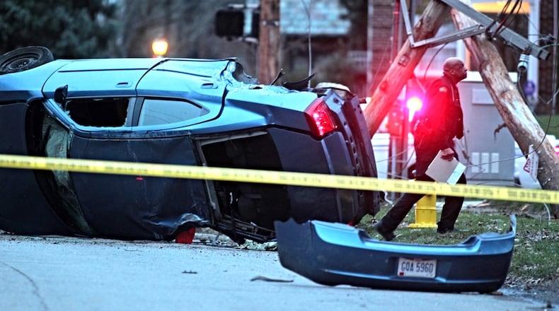 This car was stolen and left on Philadelphia Drive in Dayton on Dec. 29, 2015. (Jim Noelker/Staff)