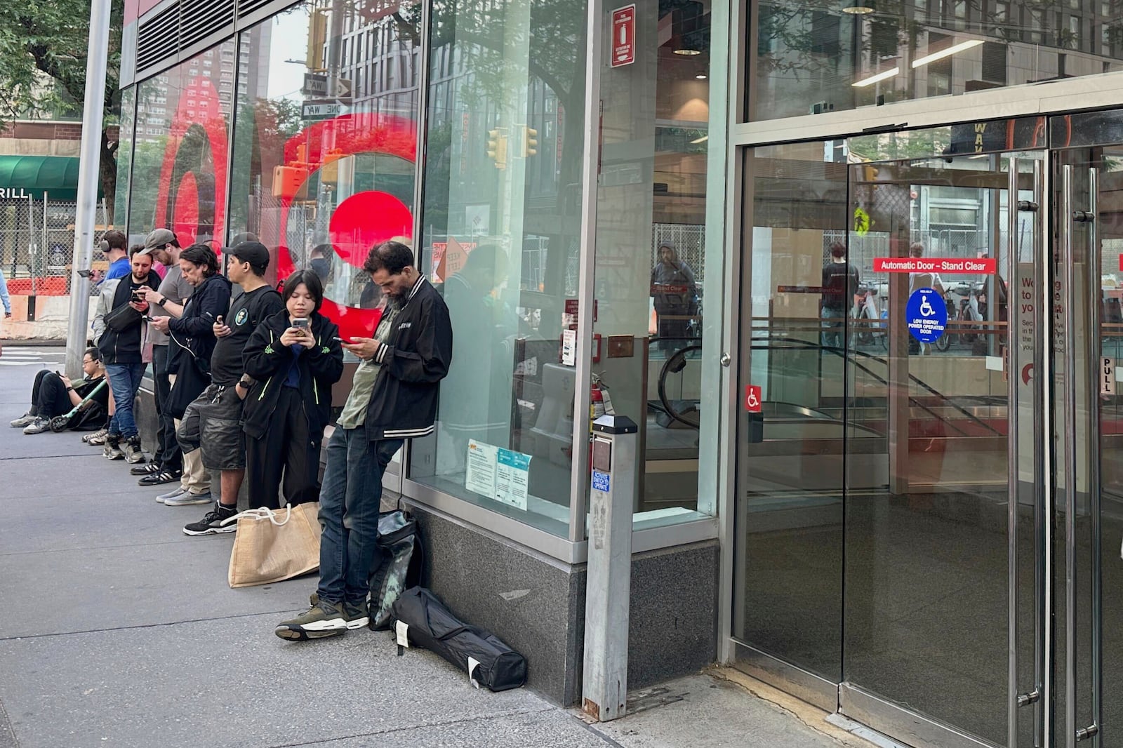 People line up outside a Target store for the new Nintendo Switch 2 video game consoles on Thursday, June 5, 2025 in New York. (AP Photo/Shawn Chen)