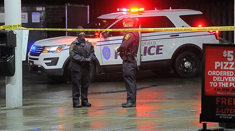 Springfield police investigate the scene of a fatal shooting at a Speedway gas station at the intersection of N. Limestone Street and E. McCreight Avenue.