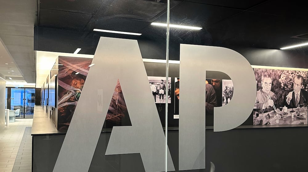 FILE - The Associated Press logo is displayed at the news organization's world headquarters in New York on April 9, 2025. (AP Photo/Aaron Jackson, File)