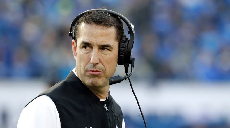 FILE - In this Dec. 7, 2019, file photo, Cincinnati head coach Luke Fickell watches from the sideline during the first half of an NCAA college football game against Memphis for the American Athletic Conference championship in Memphis, Tenn. The Bearcats return 16 starters from last year’s squad which went 9-1. (AP Photo/Mark Humphrey, File)