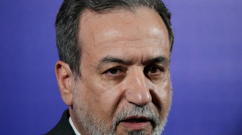 Iranian Foreign Minister Abbas Araghchi speaks in a new briefing after attending a conference titled "International Law Under Assault: Aggression and Self-Defense," in Tehran, Iran, Sunday, Nov. 16, 2025. (AP Photo/Vahid Salemi)
