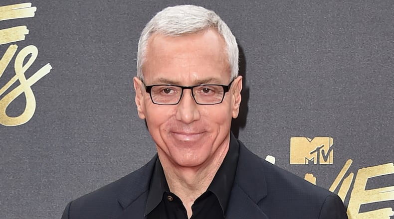 FILE - In this April 9, 2016 file photo, Drew Pinsky arrives at the MTV Movie Awards in Burbank, Calif. Pinsky's show "Dr. Drew," has been canceled by the HLN network. His last episode will air on Sept. 22. (Photo by Jordan Strauss/Invision/AP, File)