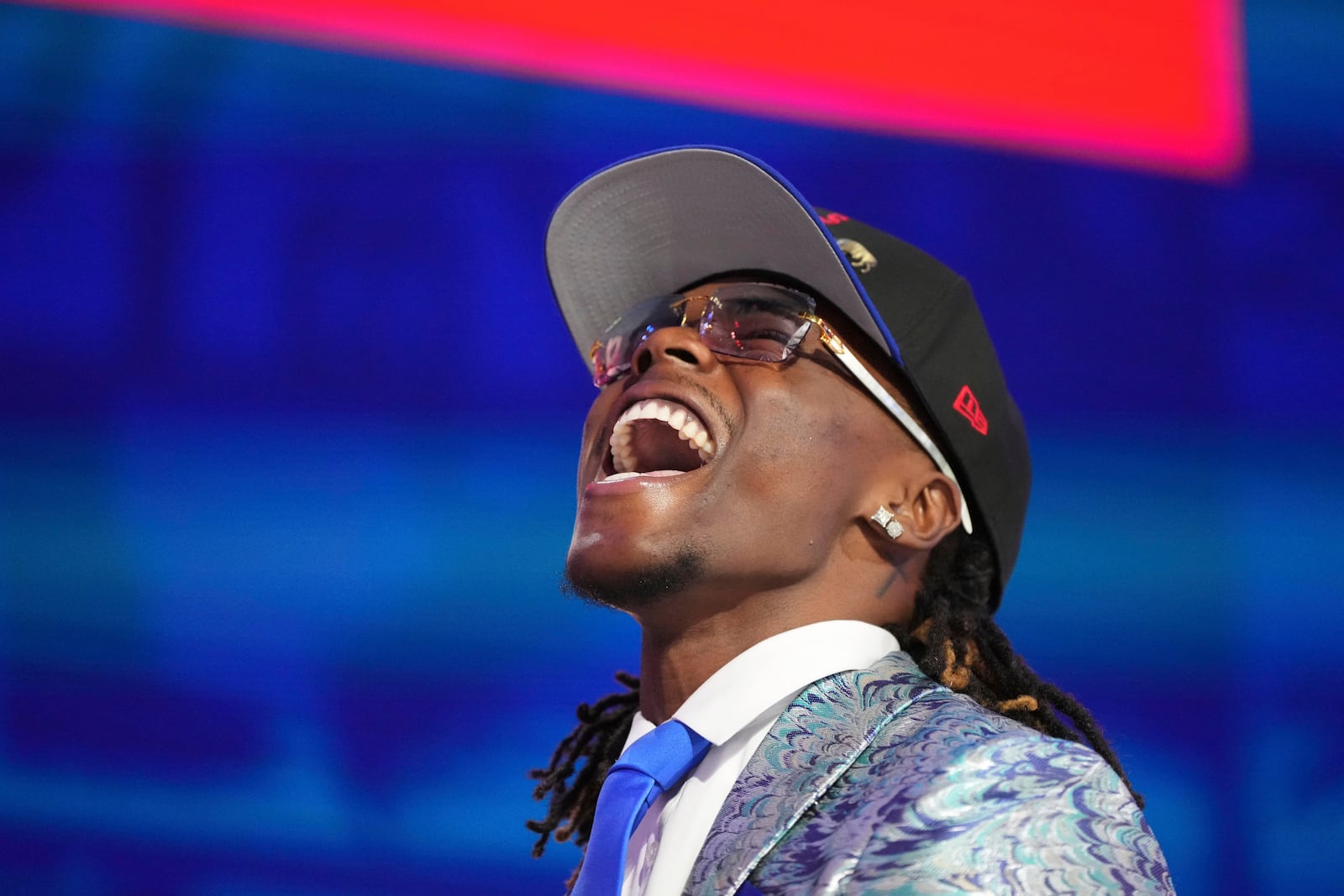 Kentucky cornerback Maxwell Hairston celebrates after being chosen by the Buffalo Bills with the 30th overall pick during the first round of the NFL football draft, Thursday, April 24, 2025, in Green Bay, Wis. (AP Photo/Jeff Roberson)