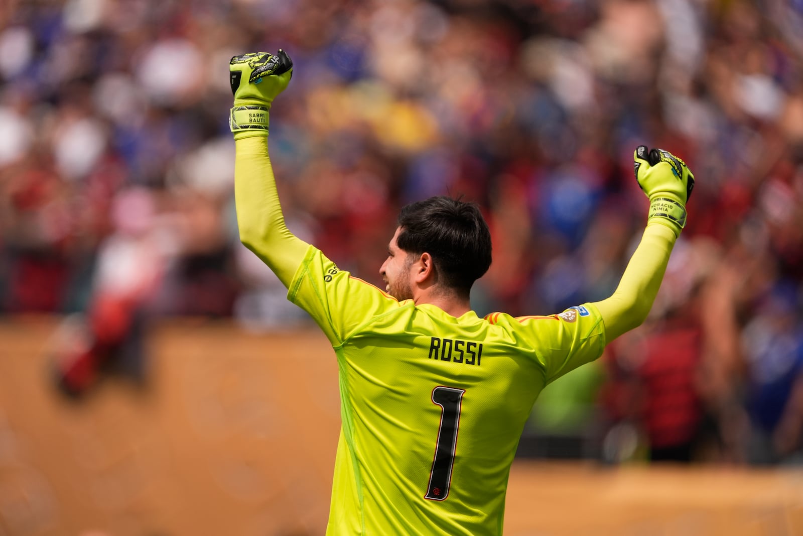Flamengo's goalkeeper Agustin Rossi celebrates his team's second goal during the Club World Cup Group D soccer match between Flamengo and Chelsea in Philadelphia, Friday, June 20, 2025. (AP Photo/Chris Szagola)