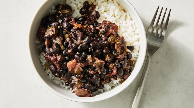 Cuban black beans can be incorporated into a number of different meals throughout the week. Food styled by Monica Pierini. (Linda Xiao/The New York Times)