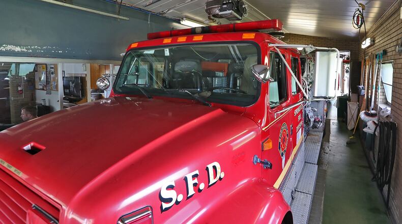 Springfield firefighters have to be careful when opening the doors on the fire engine because the garage bay is so small at Fire Station 3 on Selma. That station is looking to be replaced as the City of Springfield plans to build three new stations as well as replace that station's fire engine. BILL LACKEY/STAFF