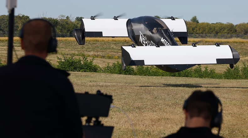 A crew from Sinclair operates a PIVOTAL Blackfly UAV as it takes off at Springfield Beckley Airport Monday, Sept. 9, 2024. BILL LACKEY/STAFF