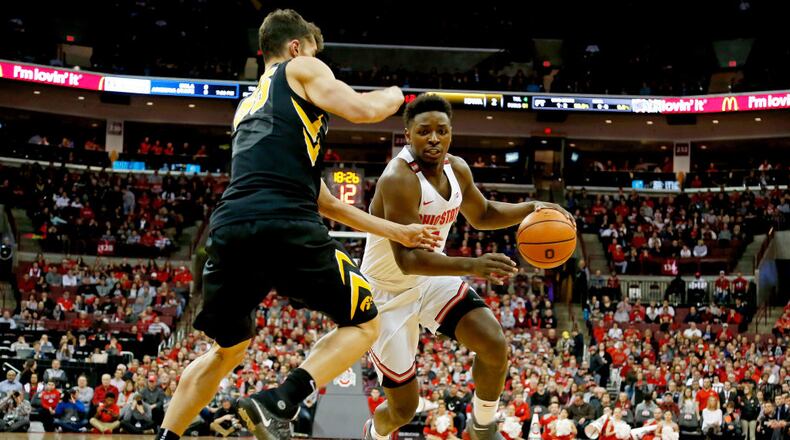 COLUMBUS, OH - FEBRUARY 10: Jae'Sean Tate #1 of the Ohio State Buckeyes drives against Luka Garza #55 of the Iowa Hawkeyes during the first half of the game at Value City Arena on February 10, 2018 in Columbus, Ohio. (Photo by Kirk Irwin/Getty Images)