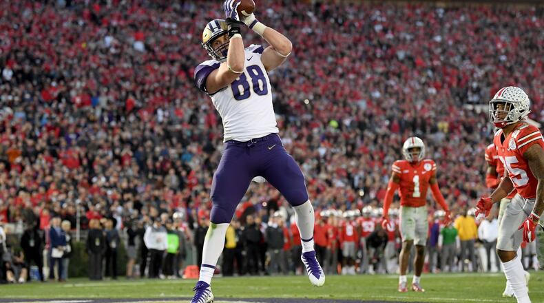 PASADENA, CA - JANUARY 01: Drew Sample #88 of the Washington Huskies scores a touchdown during the second half in the Rose Bowl Game presented by Northwestern Mutual at the Rose Bowl on January 1, 2019 in Pasadena, California. (Photo by Harry How/Getty Images)