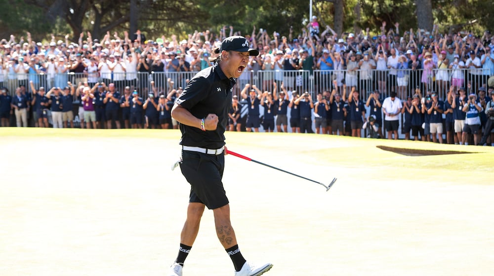 Anthony Kim of 4Aces GC reacts to his putt on the 18th green during the final round of the LIV Golf Adelaide at Grange Golf Club in Adelaide, Australia Sunday, Feb. 15, 2026. (Charles Laberge/LIV Golf via AP)