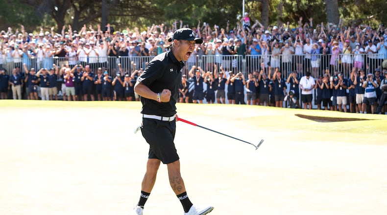 Anthony Kim of 4Aces GC reacts to his putt on the 18th green during the final round of the LIV Golf Adelaide at Grange Golf Club in Adelaide, Australia Sunday, Feb. 15, 2026. (Charles Laberge/LIV Golf via AP)